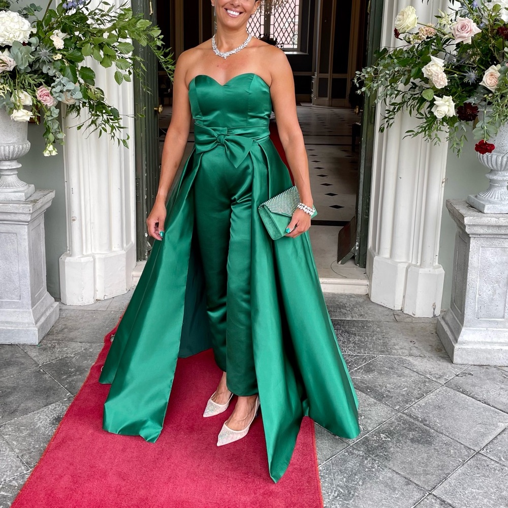 Green jumpsuit with detachable train. Beautiful! Wore only once.
